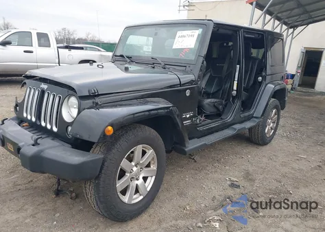 2016 Jeep Wrangler Unlimited Sahara z USA, uszkodzony, nr VIN 1C4HJWEG0GL125906